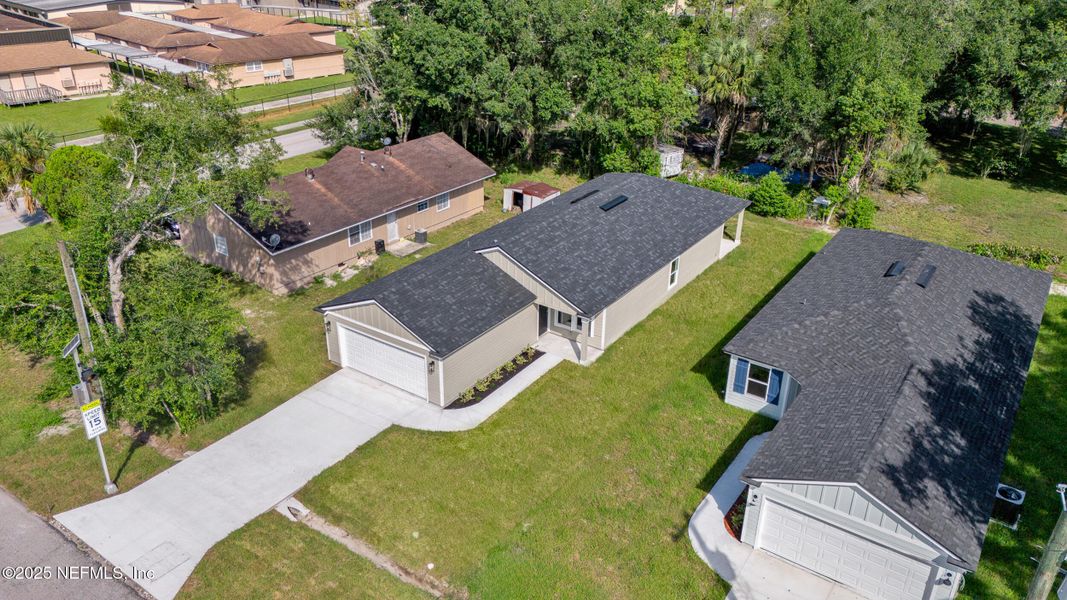 Front exterior of a new home in , Green Cove Springs, FL, highlighting curb appeal (Image 26).