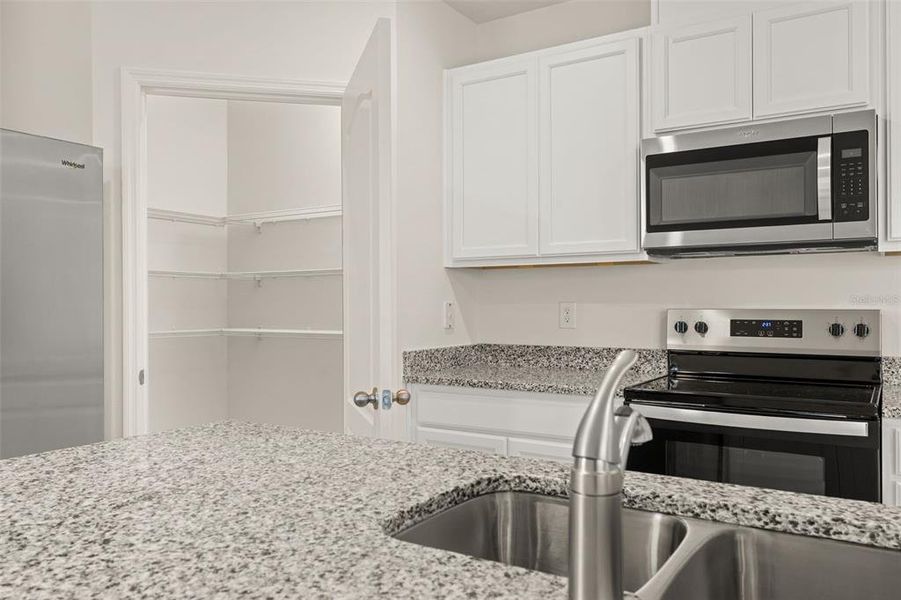 Furnished interior view inside a new home in , Kissimmee (Image 14). Furnished interior view inside a new home in , Kissimmee (Image 14).
