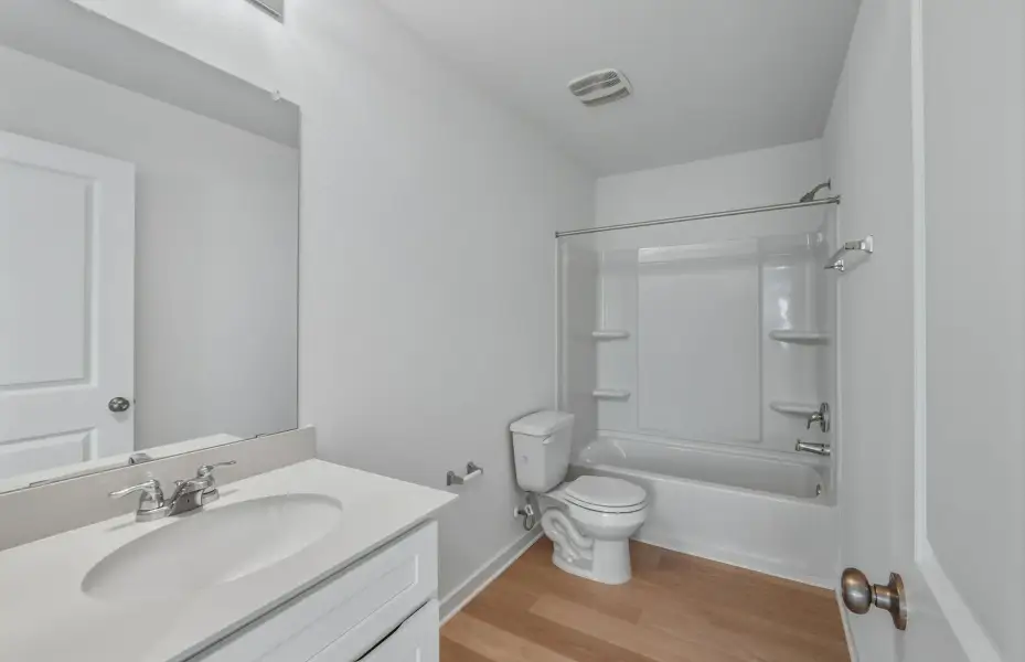 Furnished interior view inside a new home in Sunfield, Buda (Image 9).