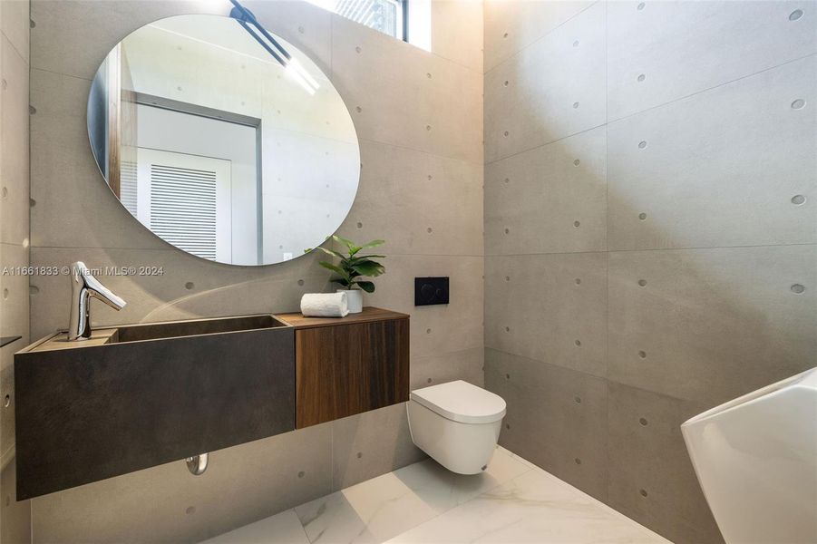 Powder room in entry way.