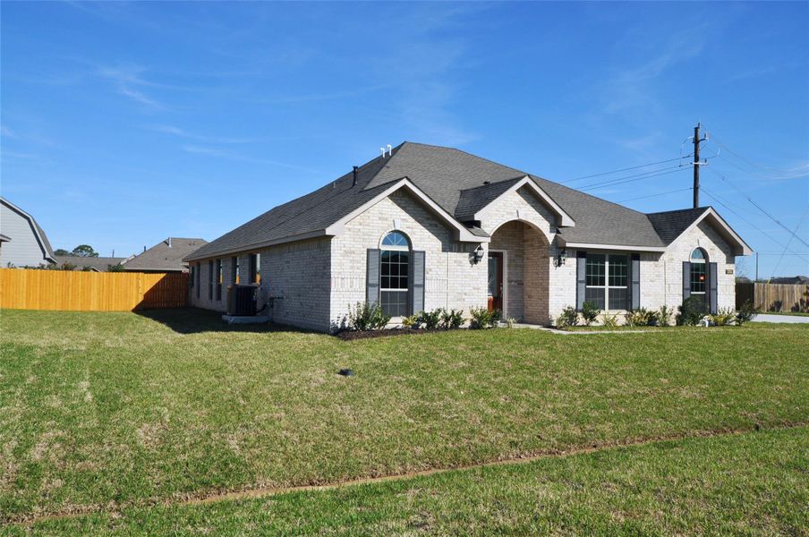 Front exterior of a new home in Pedregal, League City, TX, highlighting curb appeal (Image 25).