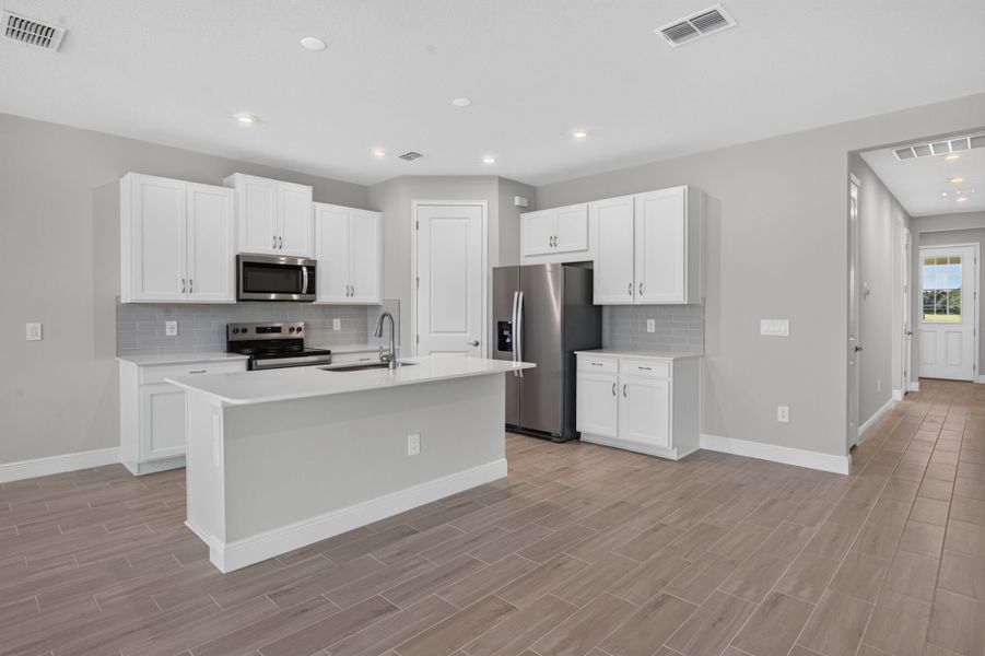 Furnished interior view inside a new home in Windwater, Parrish (Image 3).