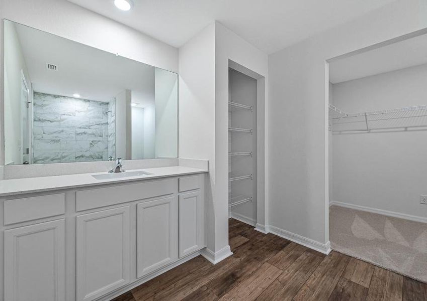 Beautiful bathroom with large vanity linen closet and walk in closet attached Beautiful bathroom with large vanity linen closet and walk in closet attached