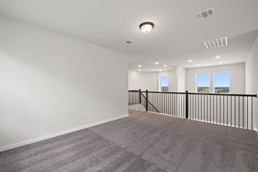 Spacious, unfurnished interior of a new home in Lariat, Liberty Hill (Image 42).