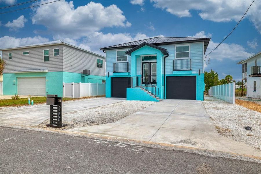 Front exterior of a new home in , Hernando Beach, FL, highlighting curb appeal (Image 1).
