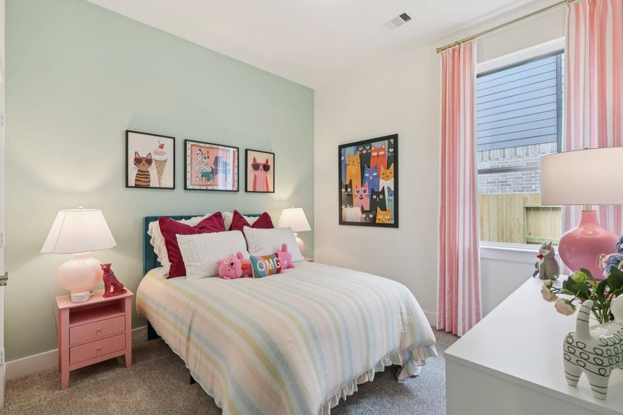 Furnished interior view inside a new home in Sunterra, Katy (Image 19).