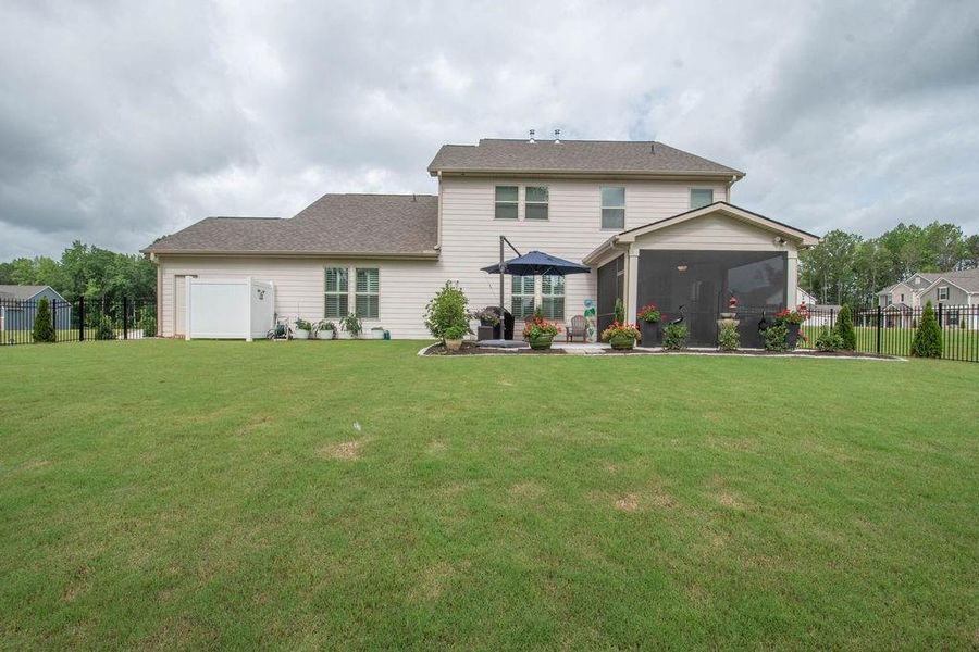 Front exterior of a new home in , Senoia, GA, highlighting curb appeal (Image 23). Front exterior of a new home in , Senoia, GA, highlighting curb appeal (Image 23).