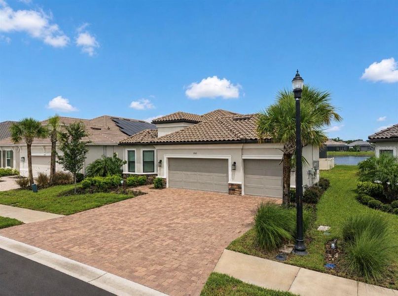 Front exterior of a new home in , Palmetto, FL, highlighting curb appeal (Image 24). Front exterior of a new home in , Palmetto, FL, highlighting curb appeal (Image 24).
