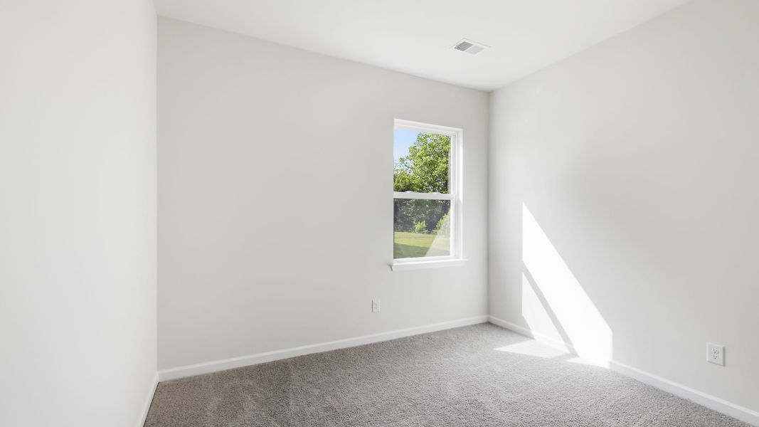 Spacious, unfurnished interior of a new home in Tap Root Farms, Fletcher (Image 16).
