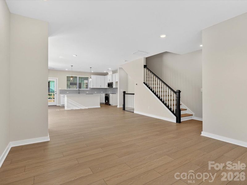 Spacious, unfurnished interior of a new home in Central Living at Craig, Charlotte (Image 20).