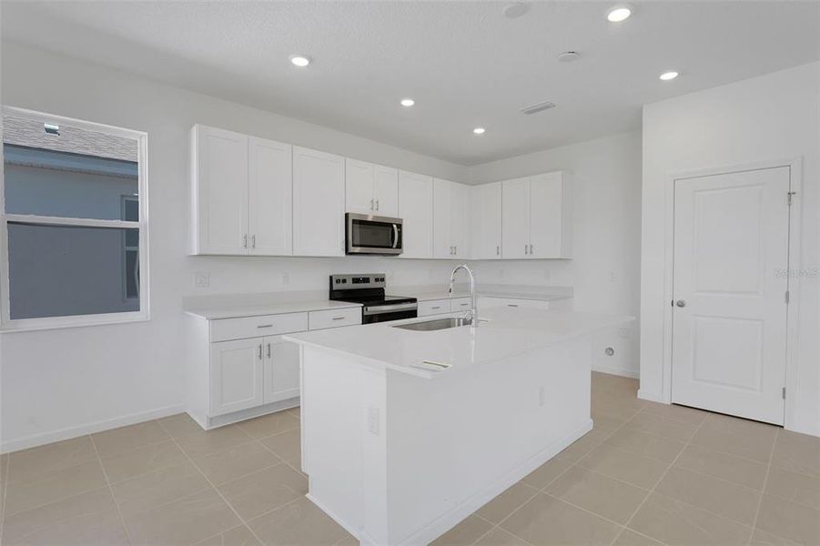 Furnished interior view inside a new home in Willowbrook North, Winter Haven (Image 11).