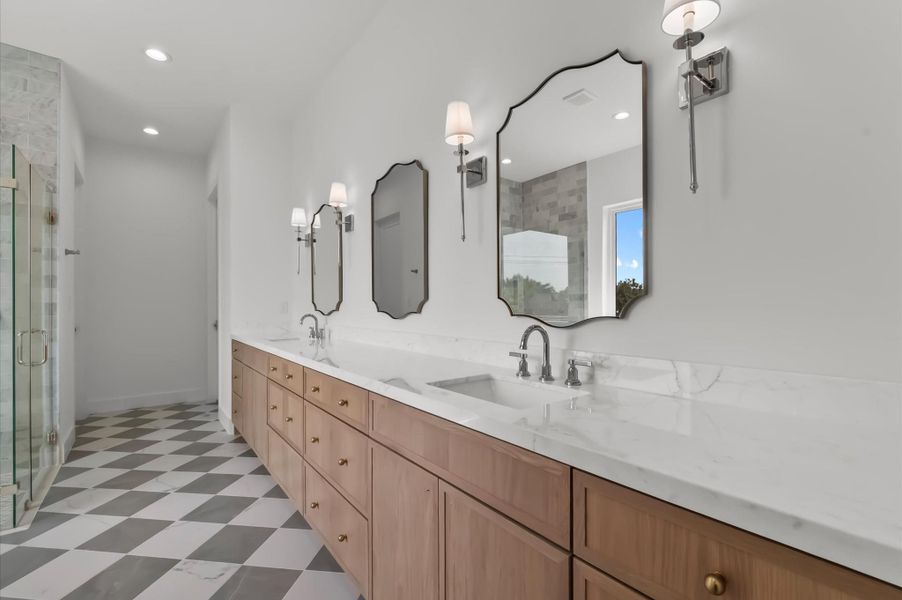 Expansive dual-sink vanity providing ample storage. Expansive dual-sink vanity providing ample storage.