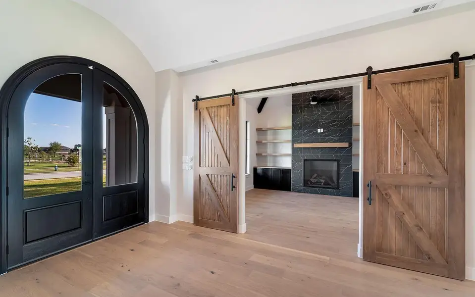 Entry with the den/study to the left.