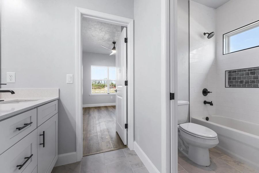 Representative furnished interior of a home built from the Thomas by William Weseman Construction in Grand Oaks, Gainesville (Image 7).