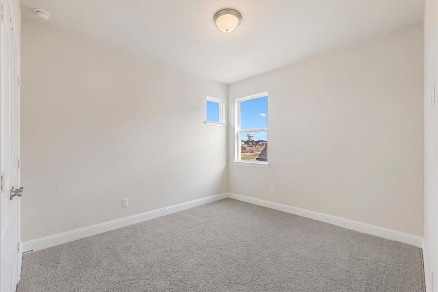 Spacious, unfurnished interior of a new home in Symmetry 37s, Frisco (Image 24).