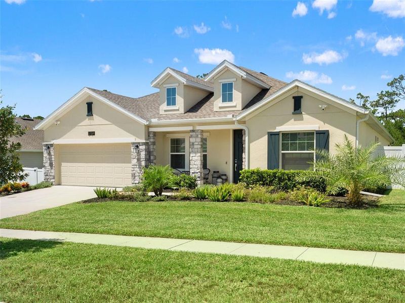 Front exterior of a new home in , Mount Dora, FL, highlighting curb appeal (Image 1). Front exterior of a new home in , Mount Dora, FL, highlighting curb appeal (Image 1).