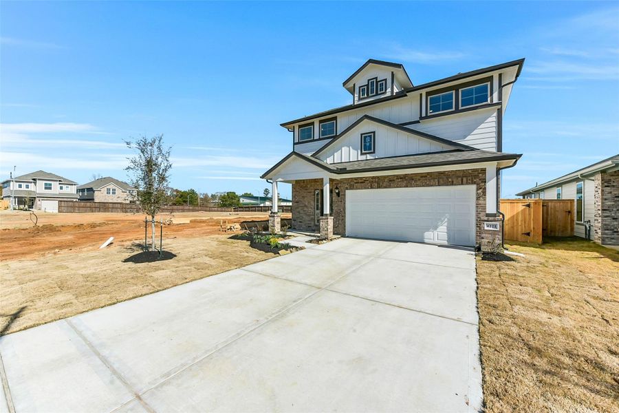 Front exterior of a new home in Colony at Pinehurst, Pinehurst, TX, highlighting curb appeal (Image 27).