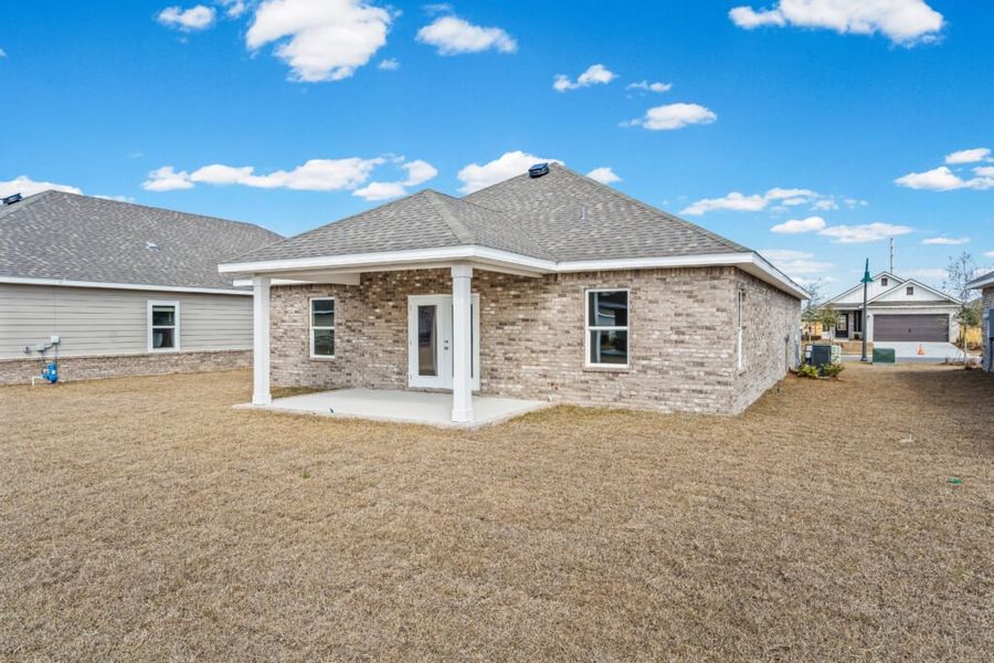 Exterior details and patio area of a home in Natureview, Freeport (Image 21).