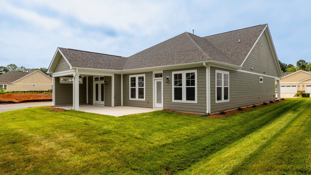 Exterior details and patio area of a home in The Villas at Pinewood, Asheboro (Image 3). Exterior details and patio area of a home in The Villas at Pinewood, Asheboro (Image 3).