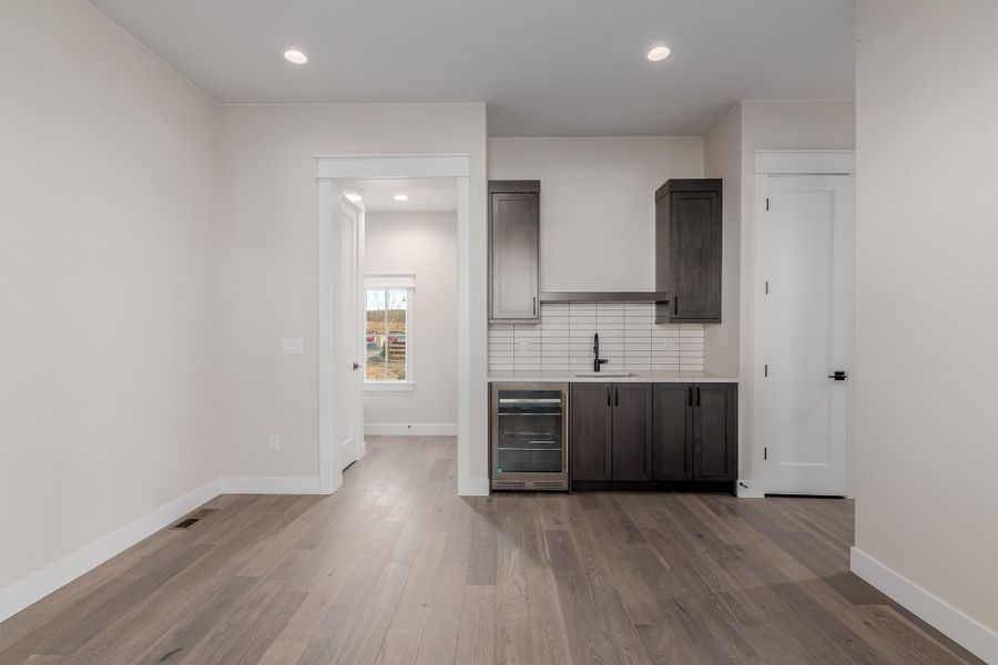Representative unfurnished interior of a home built from the Luxe by Scott Felder Homes in Westerly, Erie (Image 41).
