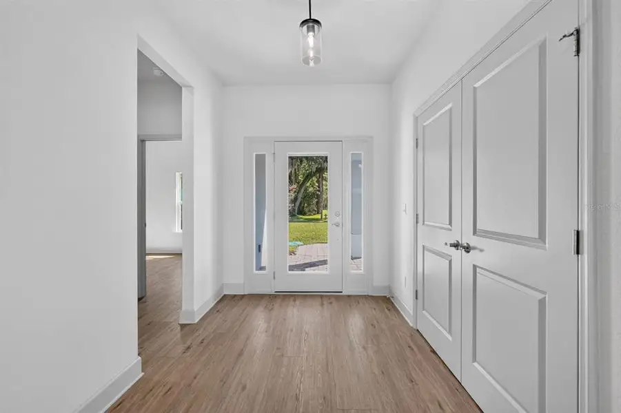 Spacious, unfurnished interior of a new home in , New Smyrna Beach (Image 35).