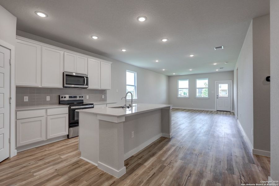 Furnished interior view inside a new home in Cinco Lakes, San Antonio (Image 12).