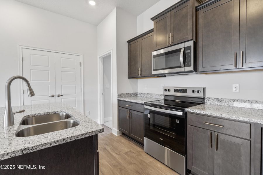 Furnished interior view inside a new home in Shadow Crest at Rolling Hills, Green Cove Springs (Image 5). Furnished interior view inside a new home in Shadow Crest at Rolling Hills, Green Cove Springs (Image 5).