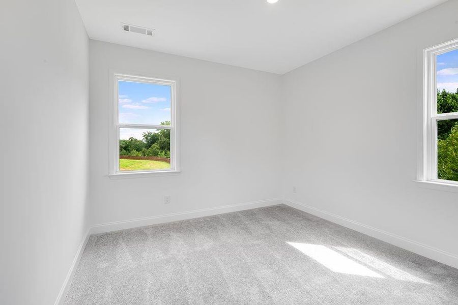 Spacious, unfurnished interior of a new home in Bennett Farm, Loganville (Image 15).