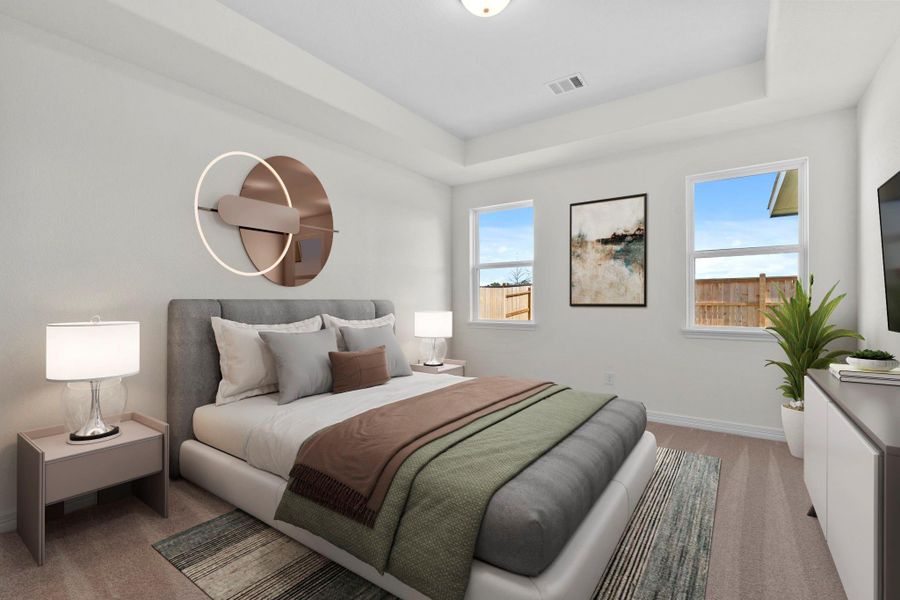 The primary bedroom is generously sized, creating a tranquil and spacious retreat that offers ample room for relaxation. Featuring plush carpet, high ceilings, fresh paint, and large windows that lets in natural lighting throughout the day.