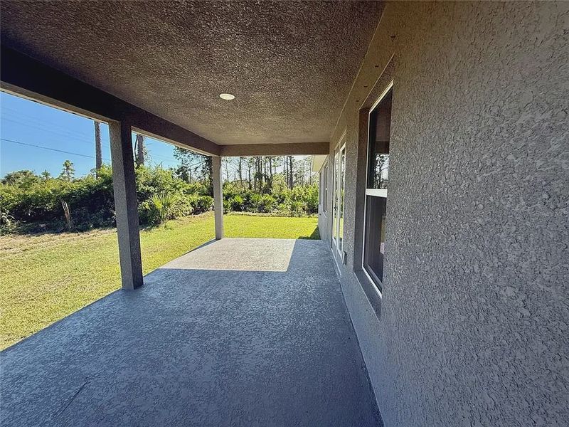 Exterior details and patio area of a home in Rotonda, Rotonda West (Image 17).