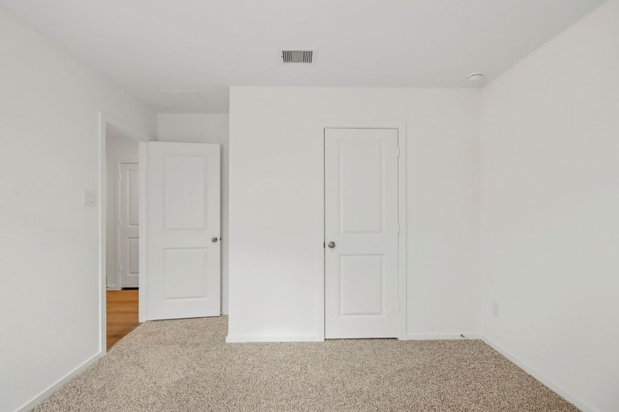 Spacious, unfurnished interior of a new home in New Waverly Station, New Waverly (Image 17). Spacious, unfurnished interior of a new home in New Waverly Station, New Waverly (Image 17).