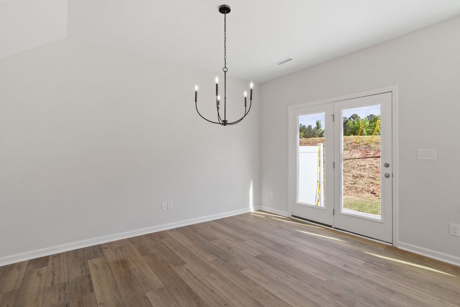 Spacious, unfurnished interior of a new home in Sweetbrier, Durham (Image 20).