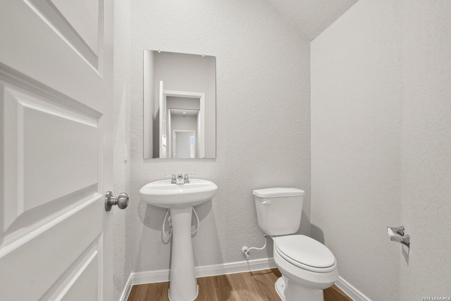 Furnished interior view inside a new home in Abbott Place, St. Hedwig (Image 11).