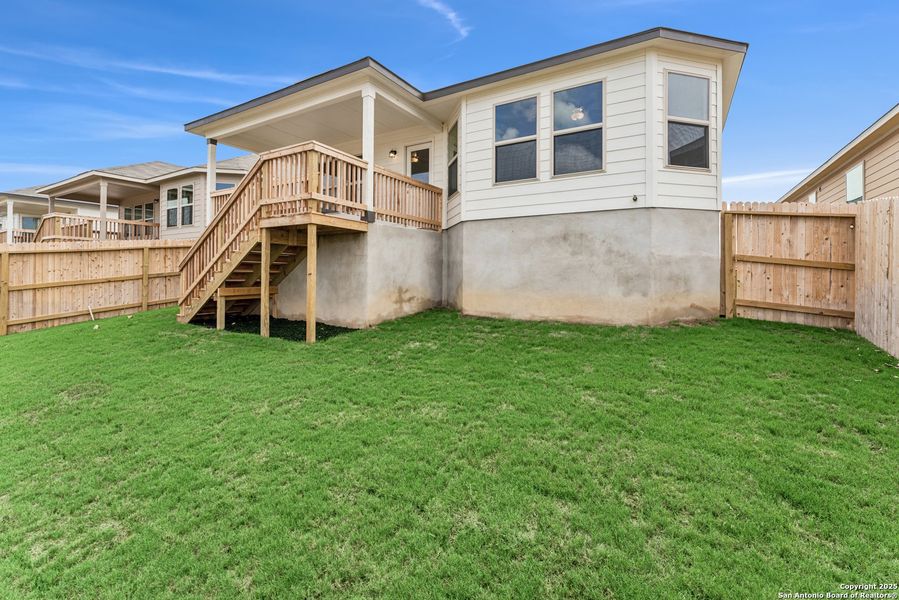 Front exterior of a new home in Mesquite Ridge, San Antonio, TX, highlighting curb appeal (Image 18). Front exterior of a new home in Mesquite Ridge, San Antonio, TX, highlighting curb appeal (Image 18).