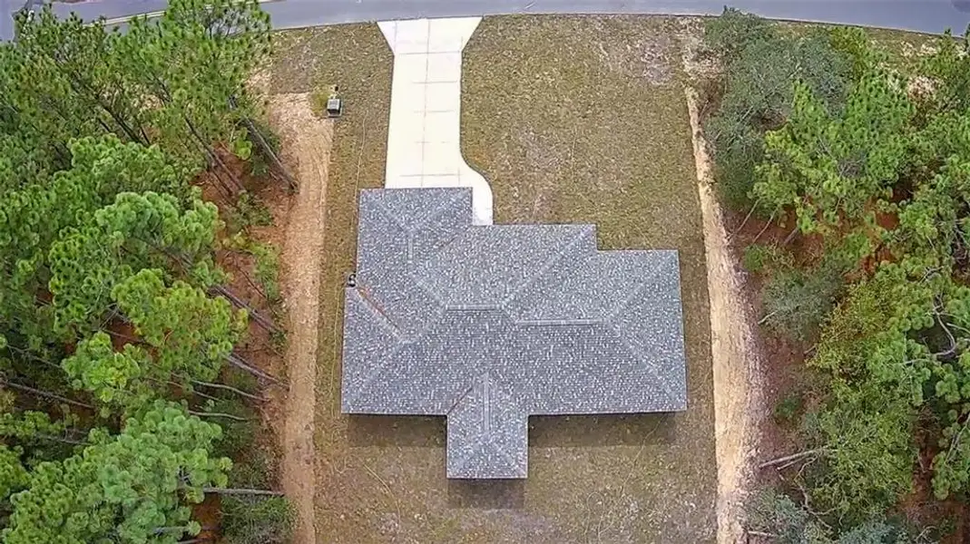 Front exterior of a new home in , Ocala, FL, highlighting curb appeal (Image 2). Front exterior of a new home in , Ocala, FL, highlighting curb appeal (Image 2).