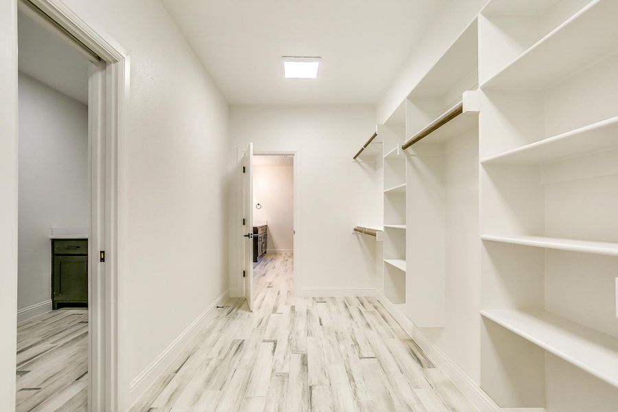 Representative furnished interior of a home built from the Cypress Court House by Trinity Classic Homes in Freeman Ranch, Weatherford (Image 16).