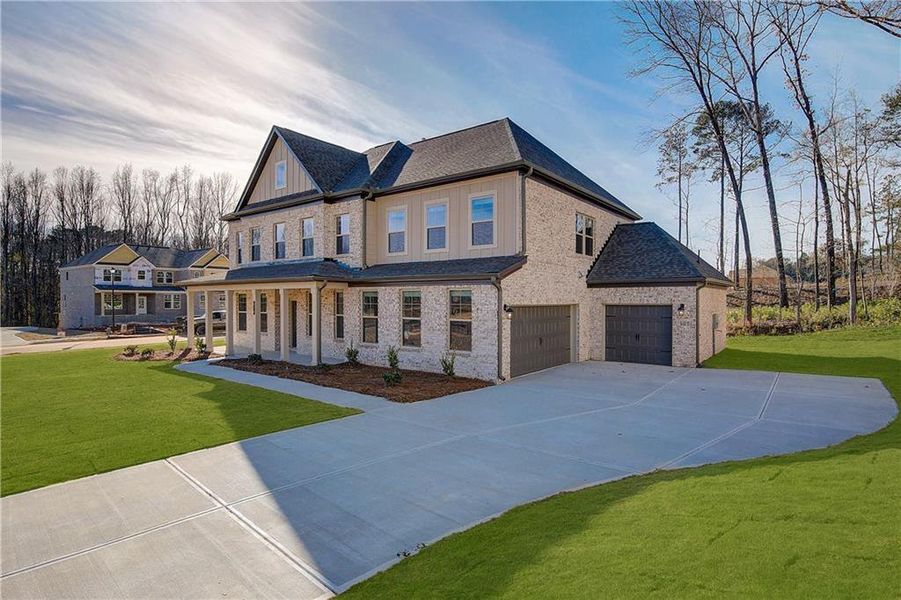 Front exterior of a new home in Trinity Park, McDonough, GA, highlighting curb appeal (Image 21).