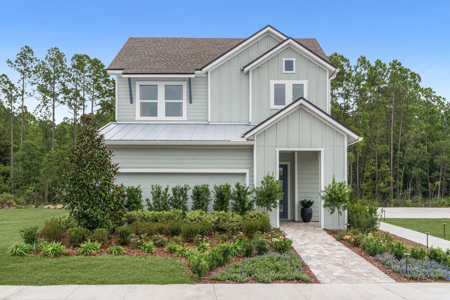 Representative exterior photo of a completed home built from the The Hollinger by David Weekley Homes in Evergreen Island at Silverleaf - Executive, St. Augustine, FL (Image 1).