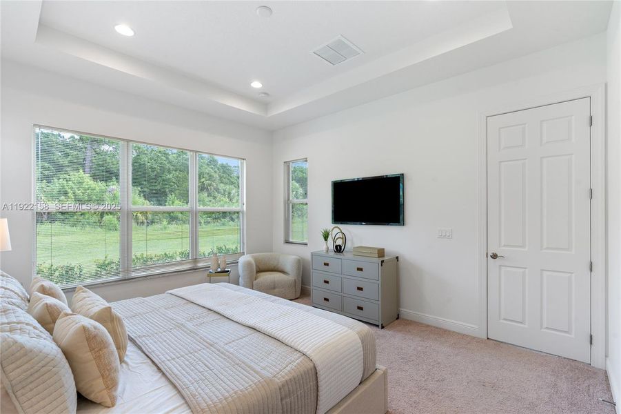 Furnished interior view inside a new home in PGA Village Verano, Port St. Lucie (Image 10).