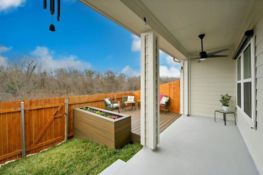 View of patio featuring ceiling fan