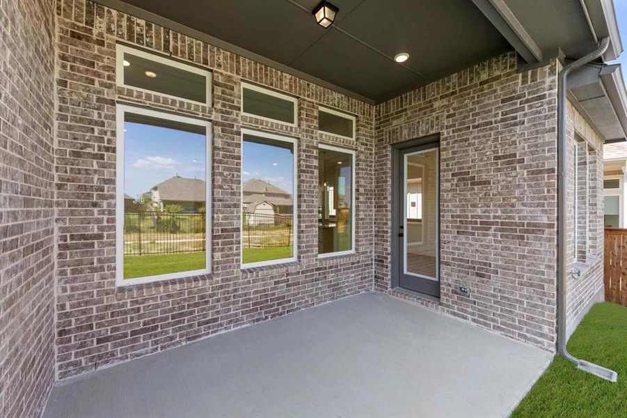 Exterior details and patio area of a home in Inspiration, Lucas (Image 2).