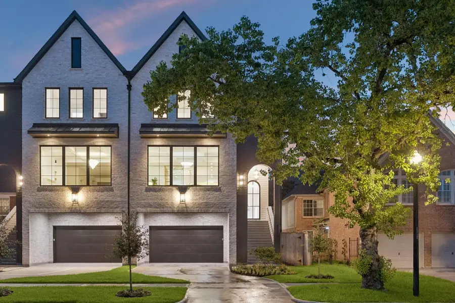 Another fantastic development from Prebisch Homes! This striking pair of Transitional residences feature a clean, symmetrical design with timeless architectural appeal. The facades are clad in Antique White Queen Brick, accented by dark trim and steep gabled rooflines. Large, black-framed windows punctuate the exterior, allowing abundant natural light while creating bold contrast against the light masonry. Another fantastic development from Prebisch Homes! This striking pair of Transitional residences feature a clean, symmetrical design with timeless architectural appeal. The facades are clad in Antique White Queen Brick, accented by dark trim and steep gabled rooflines. Large, black-framed windows punctuate the exterior, allowing abundant natural light while creating bold contrast against the light masonry.