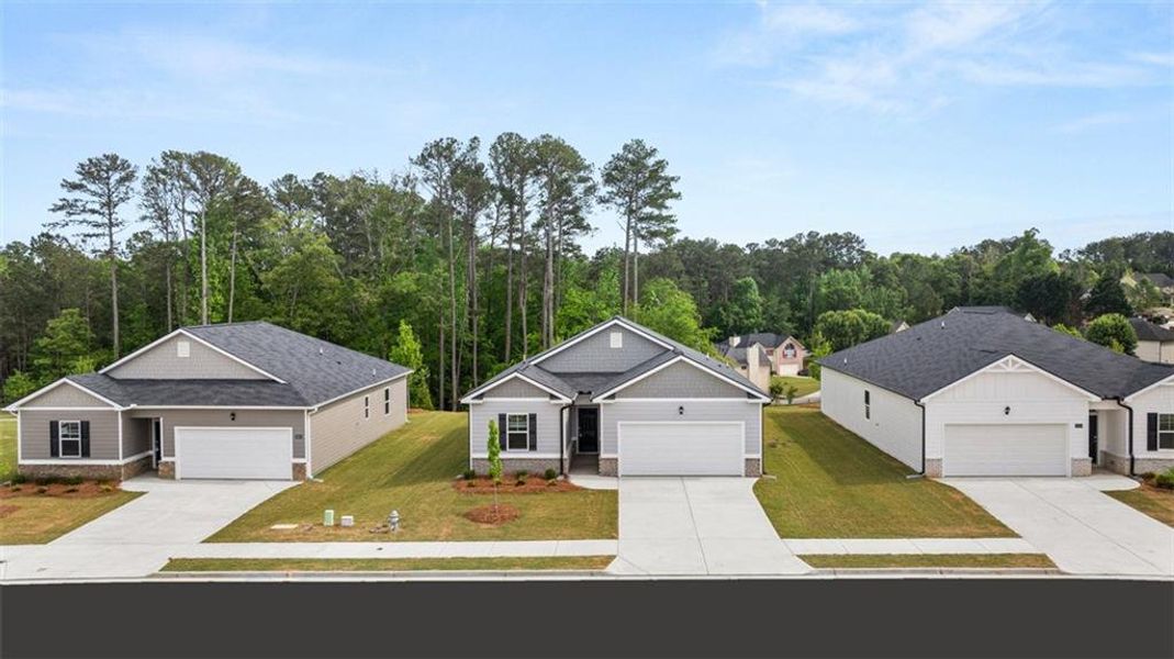 Front exterior of a new home in Champion's Run, Lithonia, GA, highlighting curb appeal (Image 22).