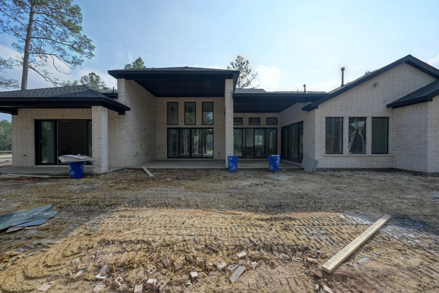 Designed to bring the outdoors in, this space invites year-round enjoyment with views of the property and room to gather or unwind.