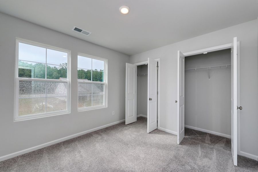 Spacious, unfurnished interior of a new home in Hainer Place, Conway (Image 28).