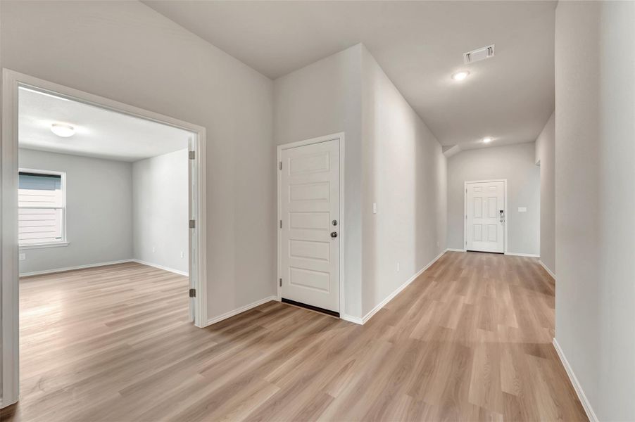 Spacious, unfurnished interior of a new home in Carillon, Manor (Image 31).