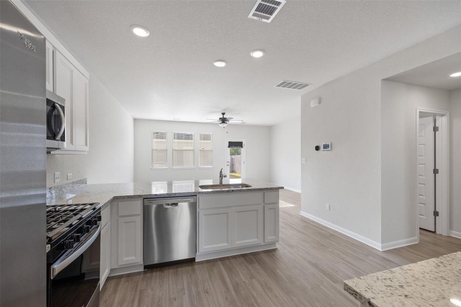 Furnished interior view inside a new home in Avery Centre, Round Rock (Image 5).