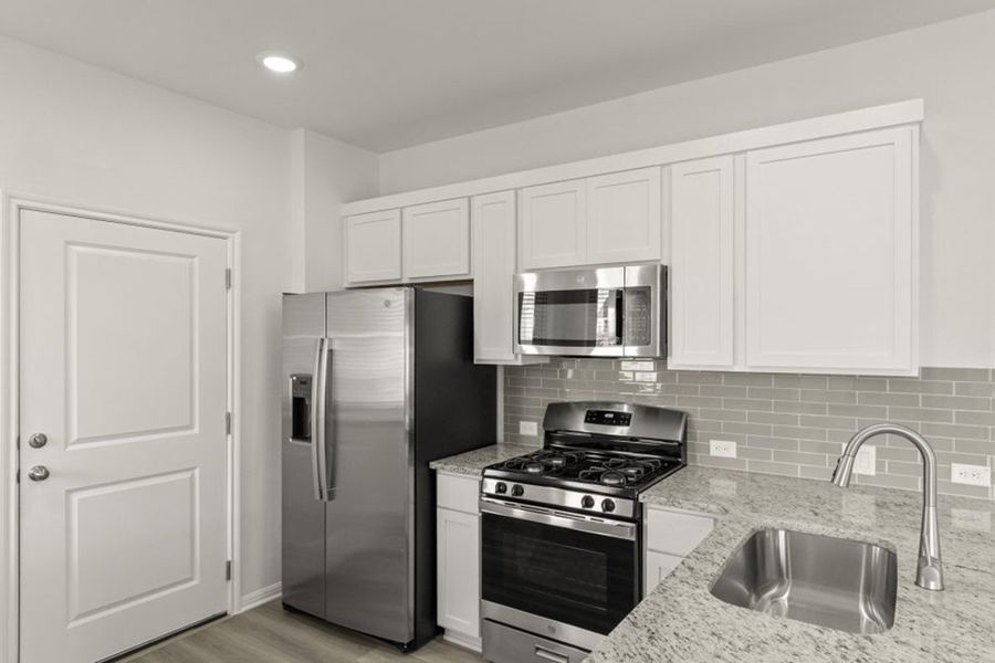 Representative furnished interior of a home built from the Frisco by Pacesetter Homes in Blanco Vista, San Marcos (Image 4).