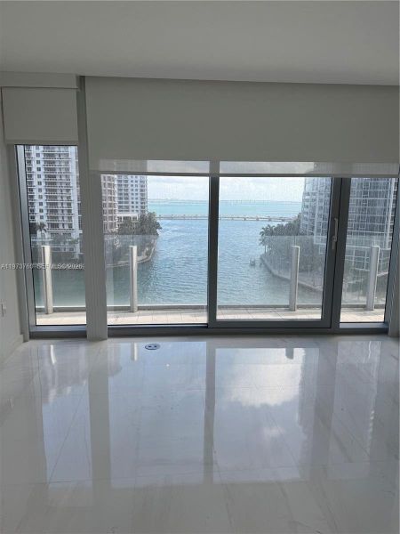 Spacious, unfurnished interior of a new home in Aston Martin Residences, Miami (Image 23).