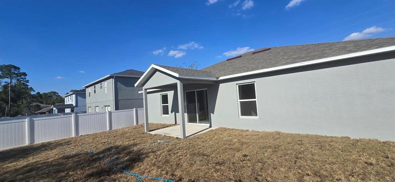 Exterior details and patio area of a home in , Poinciana (Image 2). Exterior details and patio area of a home in , Poinciana (Image 2).
